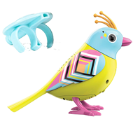 A bright DigiBird with a blue head next to a light blue whistle.