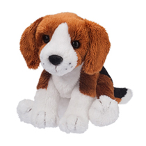 A cute little beagle plush sitting down.