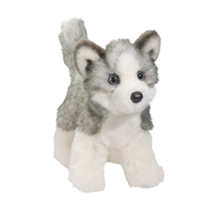 A very fluffy husky plush.