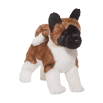 An alert dog plush with a black face.