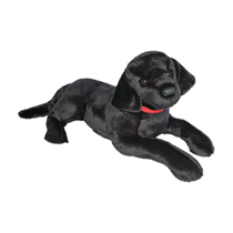 A black dog plush laying down.