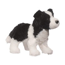 A fuzzy black and white dog plush.