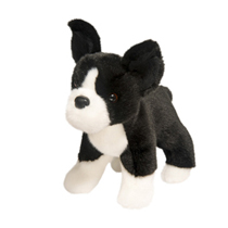 An alert black and white dog plush.