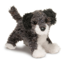 A frizzy gray and white dog plush.