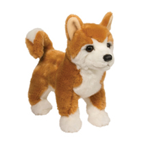 A cute dog plush with a curled tail.