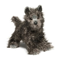 A frazzled dog plush with gray fur.