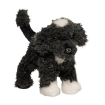 A curly gray and white dog plush.