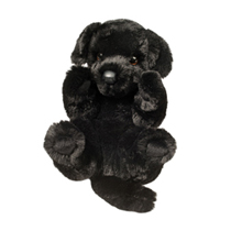 A cuddley black dog plush.