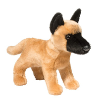 A cute dog with black ears and snout standing up.
