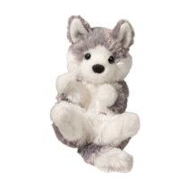 A cute plush husky all curled up.