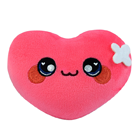 A light pink heart plush with a white flower.