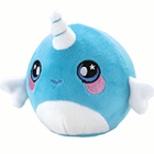 A round blue narwhal plush.