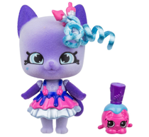 A purple cat wearing a fancy dress and hair accessory.